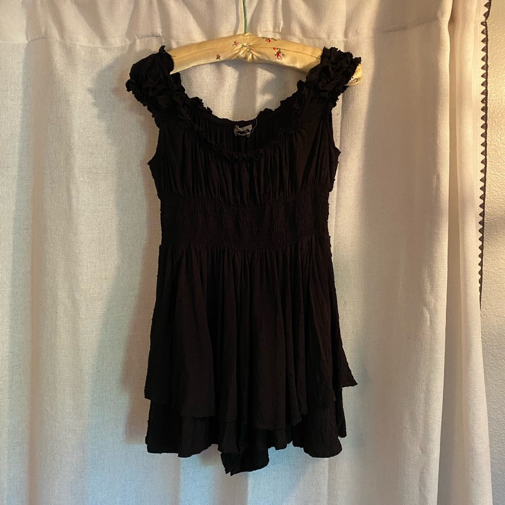 Black Swiss dot romper from Urban Outfitters